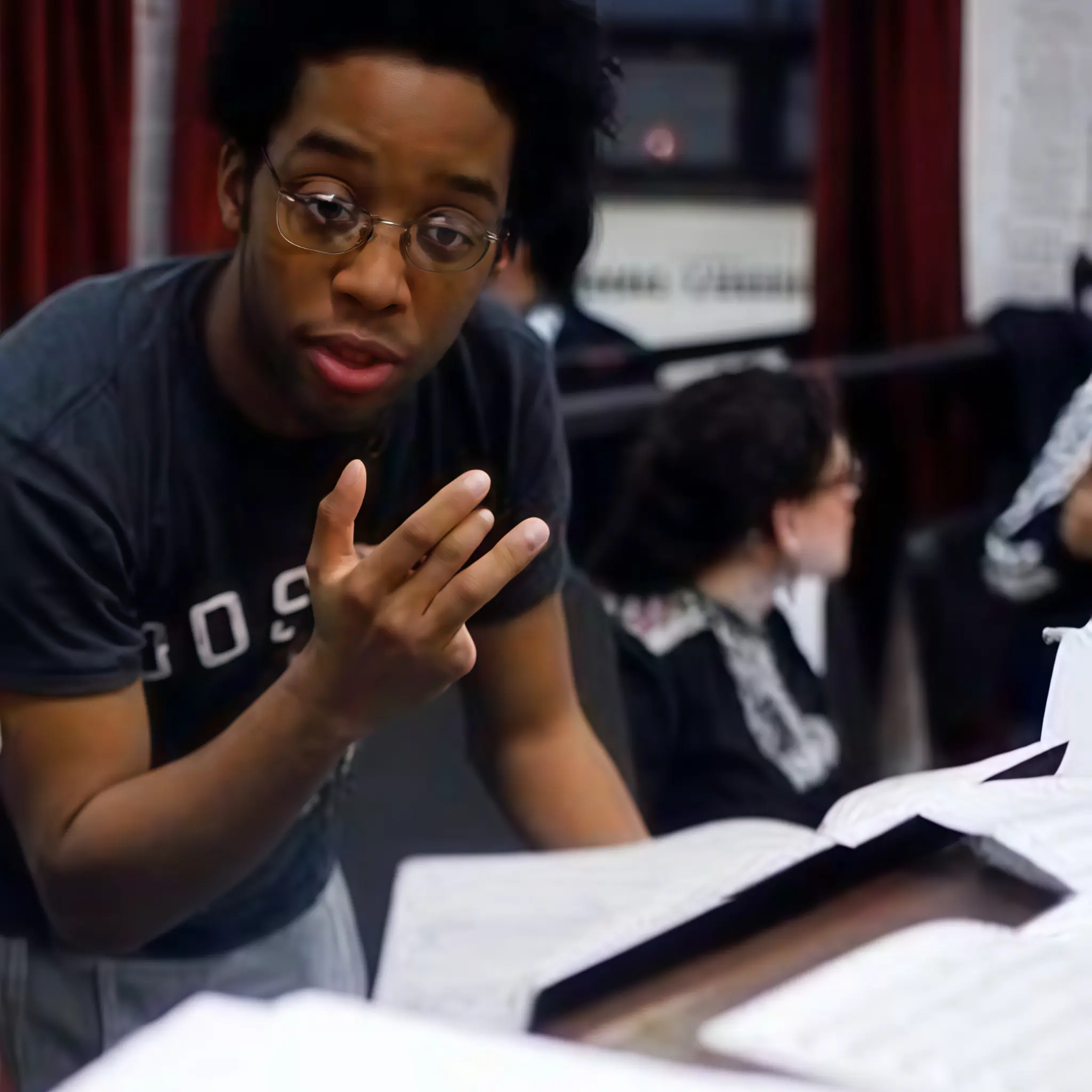 Jamon Maple music directing at piano